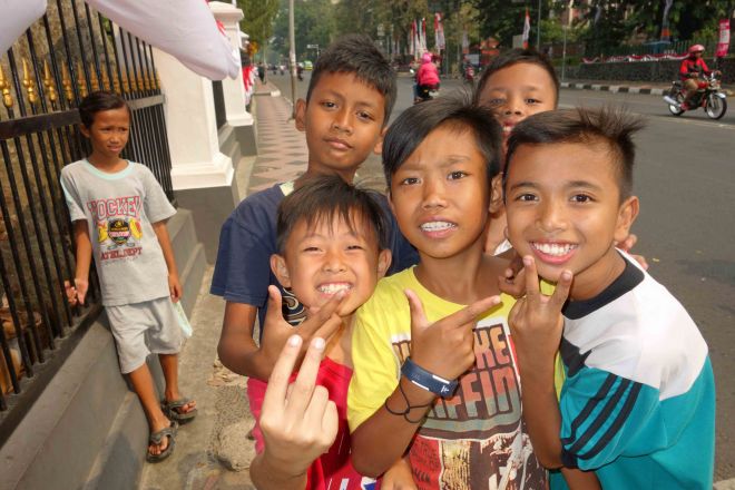 Boys outside Bogor Palace, Bogor, Java, Indonesia